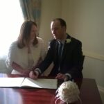 Andrew and Louise sign on the dotted line